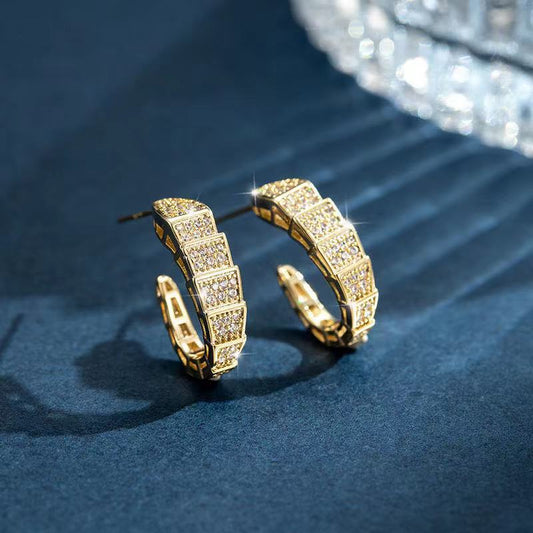 CZ gold plated earring.
