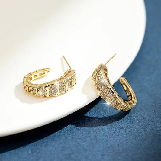 CZ gold plated earring.